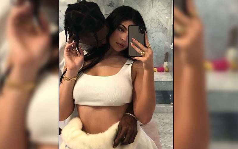 Pregnant kylie jenner leaves little to the imagination in sheer lace bodysuit at nyfw